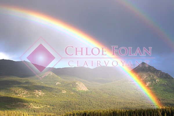 Rainbow landscape shot with watermark.